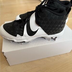 Nike Black and White cleats with Classic Design